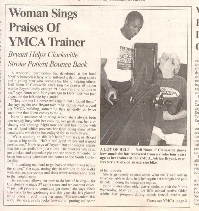 News Photo of Adrian Bryant helping Nell Nunn