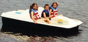 kids on a paddleboat