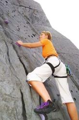 man rock climbing